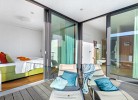 Miramar - Balkon verbindet Schlafzimmer und Wellnessbad 